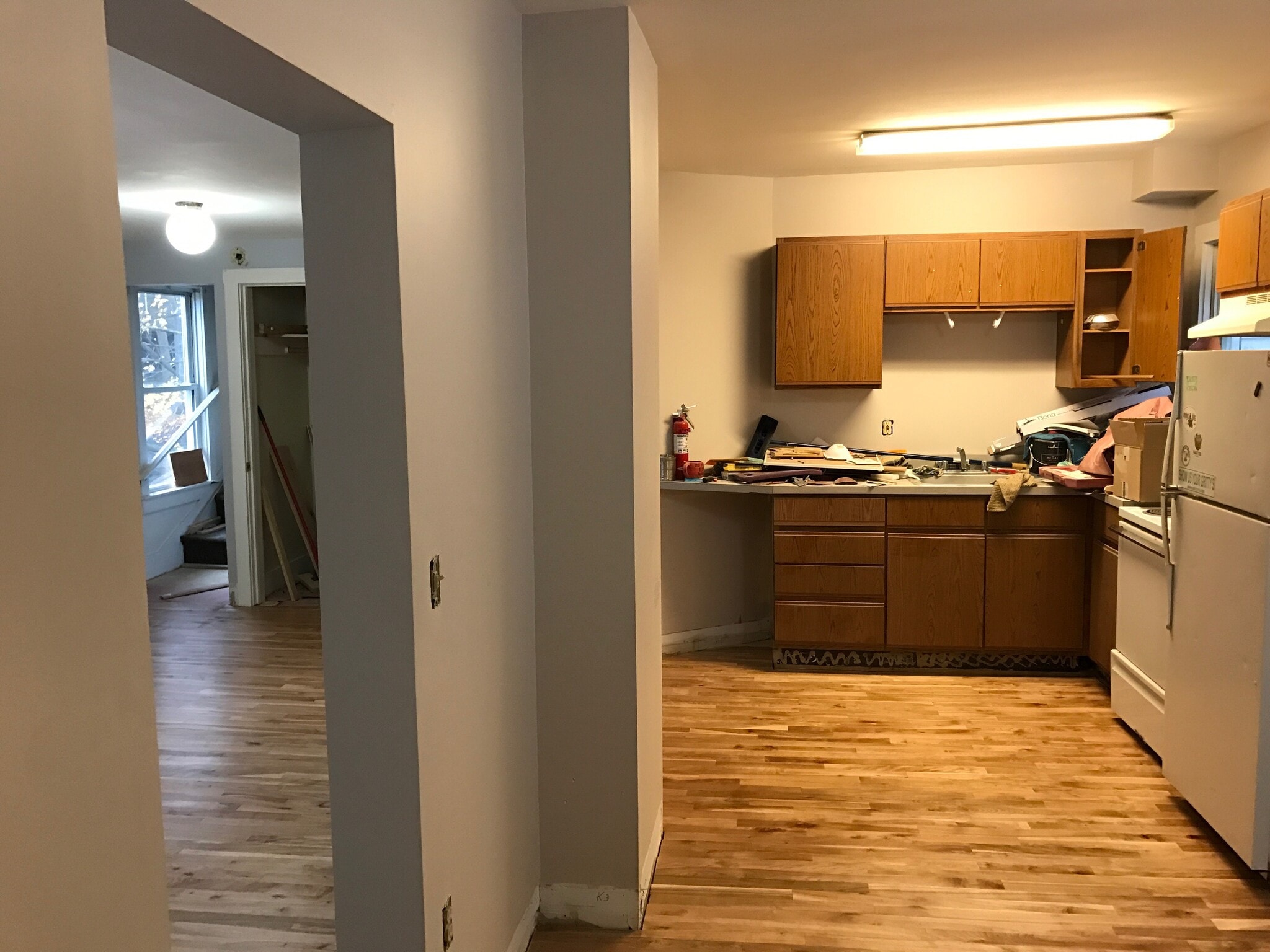 This unit is under a few renovations, so please excuse the tools on the kitchen counters. Recently laid hardwood floors throughout kitchen and living room. Nice light throughout the day! - 12 Boynton Street