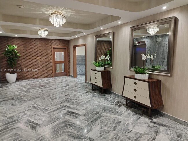 Building Photo - 5401 Collins Ave