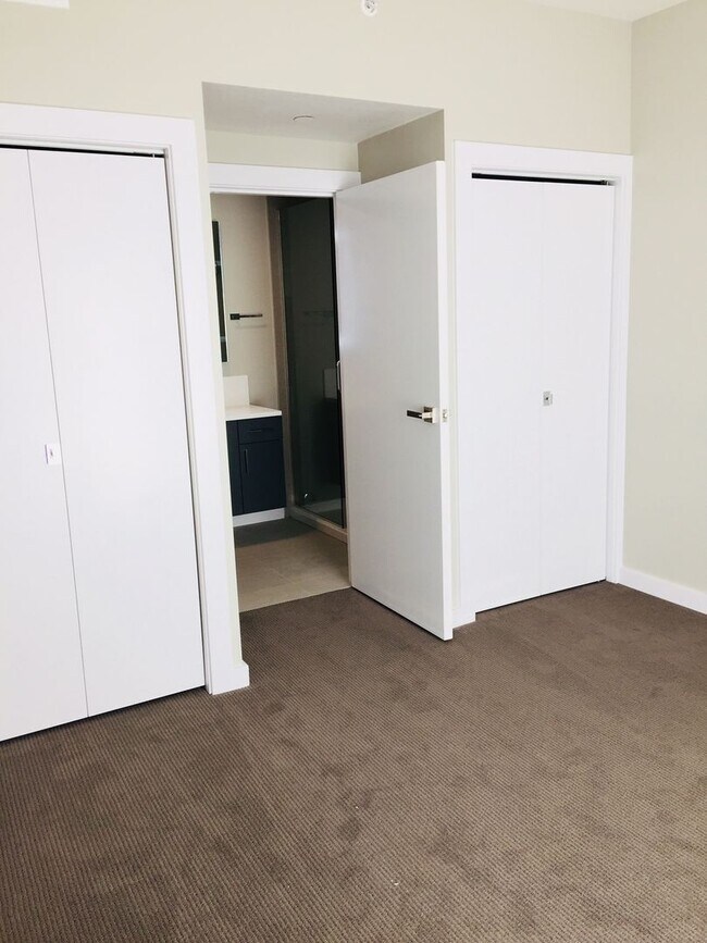 Building Photo - Rare Living Opening at Talbach Condominiums