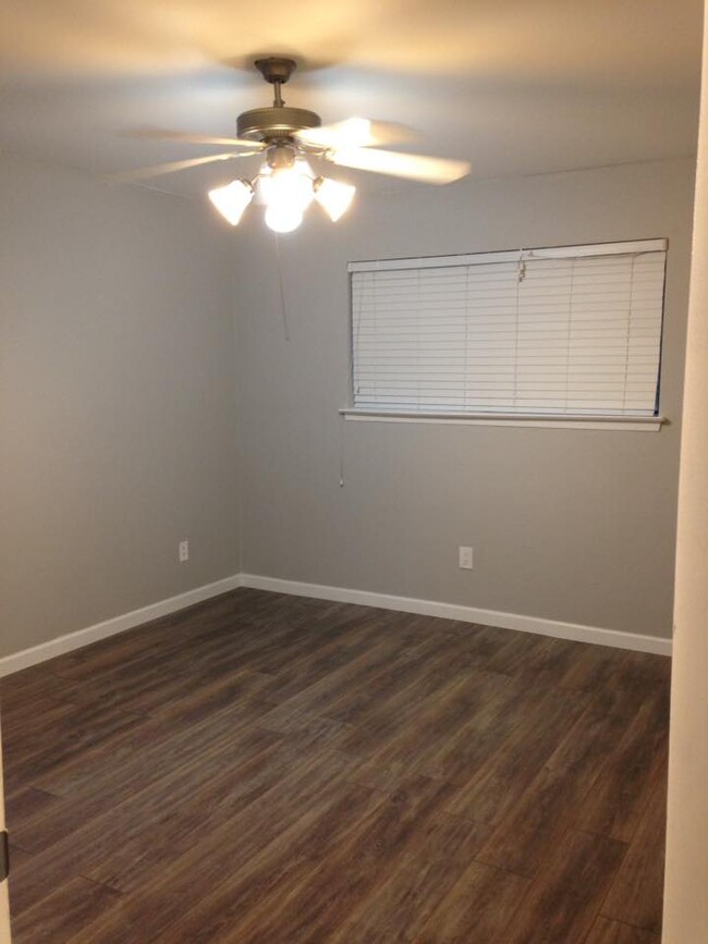 Spacious master bedroom easily fits king size bed and furniture. Features walk in closet as well! - 11401 Ptarmigan Dr