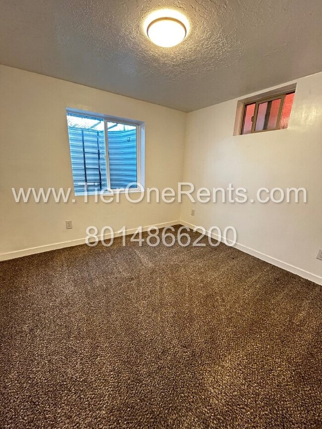 Building Photo - NO DEPOSIT option available for qualified ...