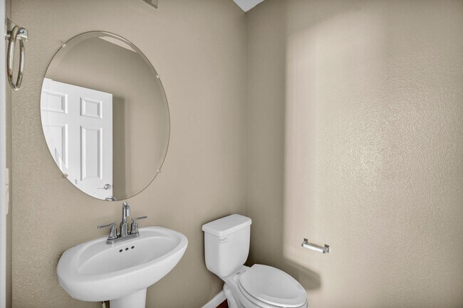 Building Photo - Sun-Filled, Spacious Living with a Three-Car Garage