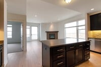 Building Photo - Gorgeous 2 BD/2BA Top Floor Condo In Great Peloton Community! Available August 7!