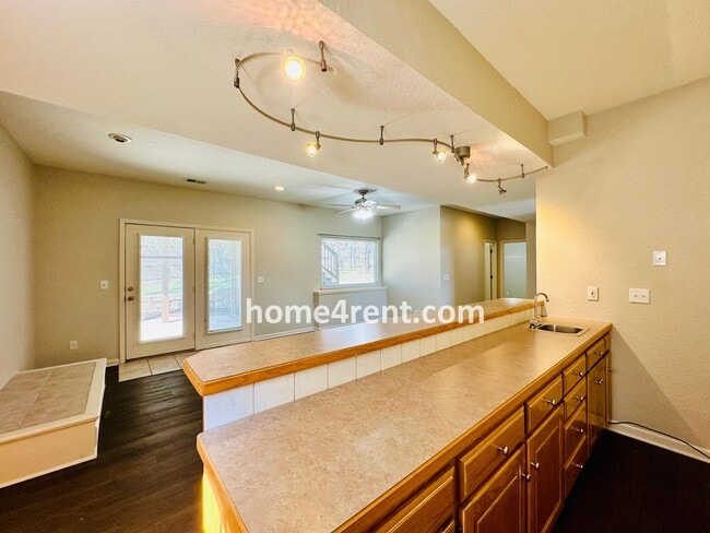 Building Photo - Beautiful Home in Blue Valley Schools w/ Wood Floors, Finished Basement and a Peaceful, Private F...