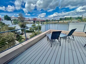 Building Photo - Spacious 2BR/2BA Condo – 1,086 SF + Parking + River Views | NW Portland