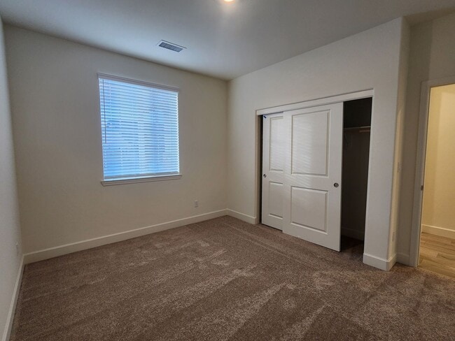 Building Photo - New 4 bedroom  home in Heybourne Meadows area of Minden.