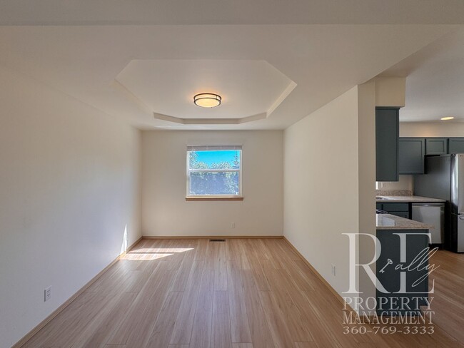 Building Photo - Immaculate Bremerton Home with Expansive Yard, Multiple Living Areas & Designer Kitchen