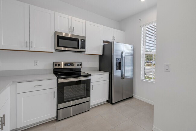 Kitchen - stainless steel appliances - 6111 Fairmont Ln
