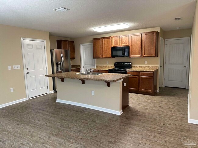 Building Photo - 6482 Flora Court