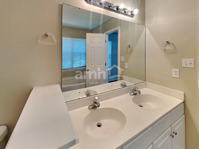 Building Photo - 8638 Flowers Court