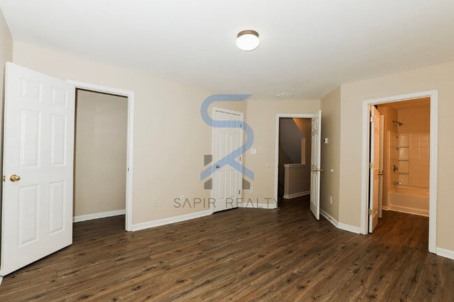 Building Photo - Move in before February 28th and choose your reward: a $250 Amazon Gift Card or a 55" Smart TV!