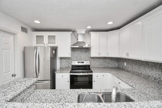 Building Photo - 8573 Wilcrest Dr