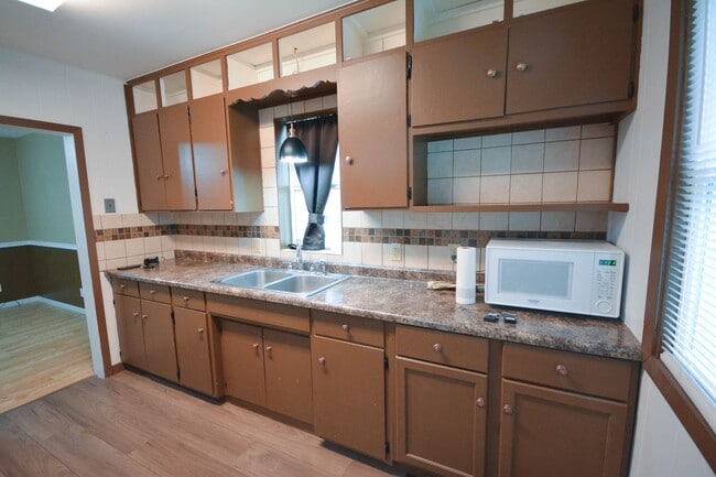Building Photo - Adorable Austin home on corner lot with 2-car garage!