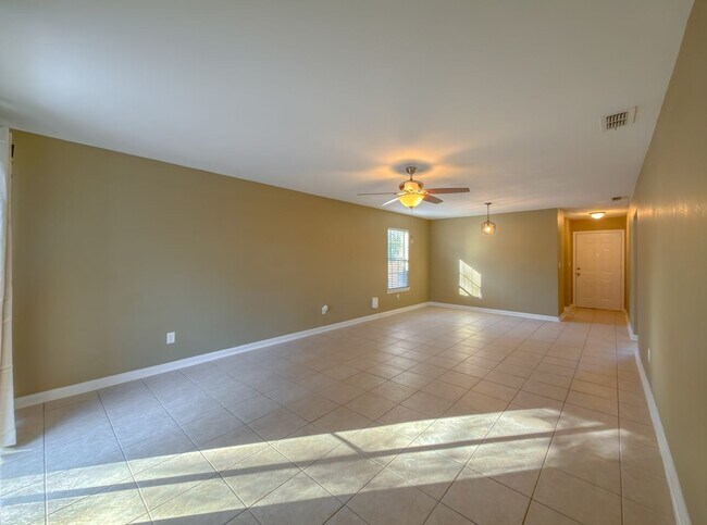 Building Photo - LOVELY & Modern NW 2/1 w/ New Flooring & Huge Privacy Fenced Yard that Inc Lawn Maintenance! Avai...