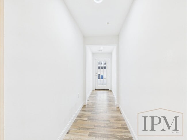 Building Photo - 2-bedroom 2.5 bath Luxury Townhome located...