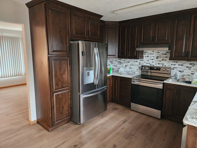 Building Photo - Three bedroom two bathroom house for rent