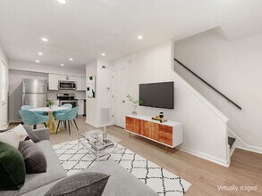 Building Photo - Half Month FREE — Updated 2BR w/ In-Unit Laundry, Central A/C + 2 Parking Spots | Touring starts ...