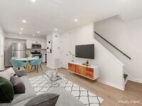 Building Photo - Half Month FREE — Updated 2BR w/ In-Unit Laundry, Central A/C + 2 Parking Spots | Touring starts ...