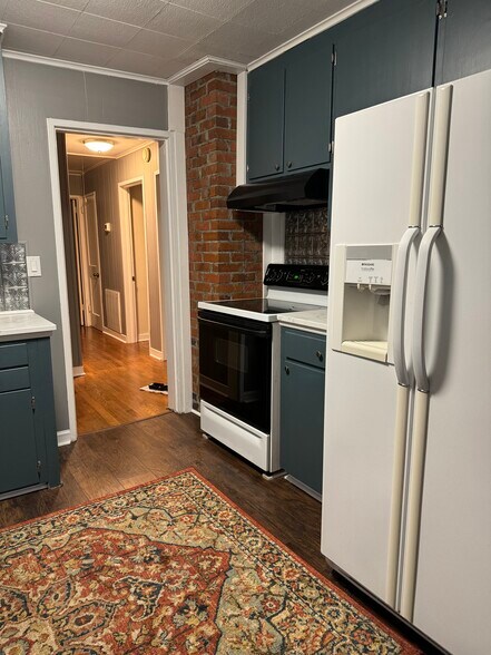 Large refrigerator, glass top stove & hood - 1104 Kenwood Ave