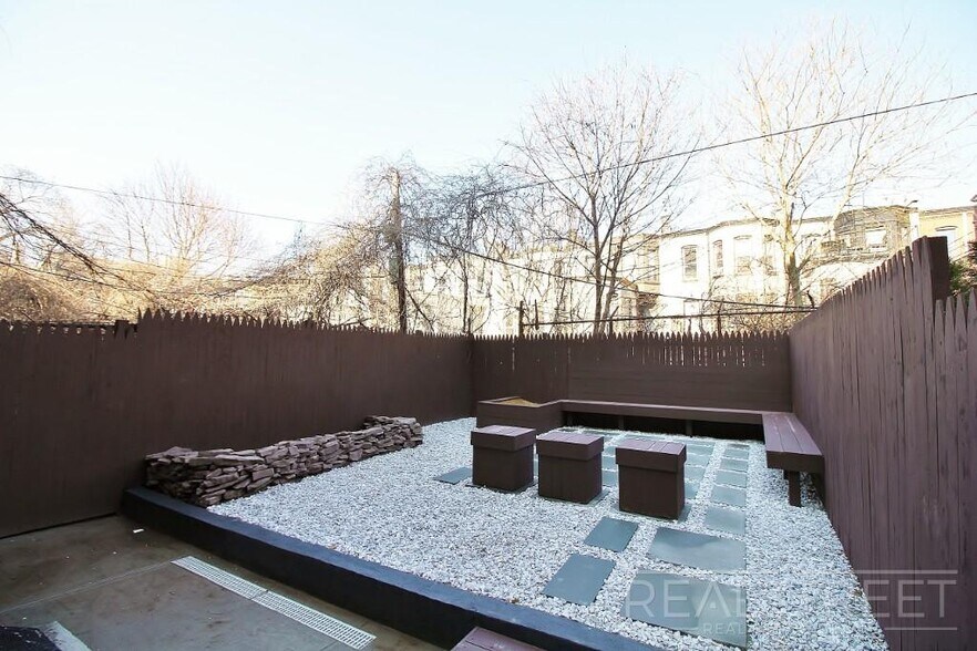 Building Photo - Spacious 2BR w/ Laundry, Pets OK, Backyard & Lounge | Steps to Brower Park & 3/4/C Trains