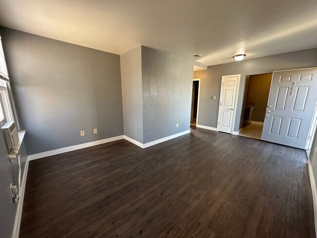 Explore this inviting living space featuring sleek design elements. - Williams Street