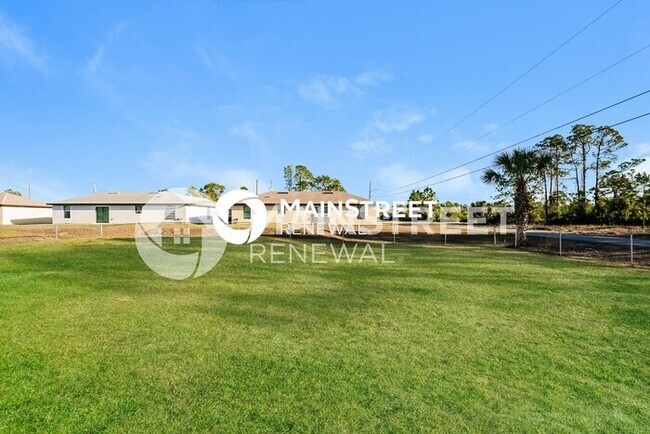 Building Photo - 4 Bedroom Pet-Friendly Home in Lehigh Acres, FL with Main Street Renewal