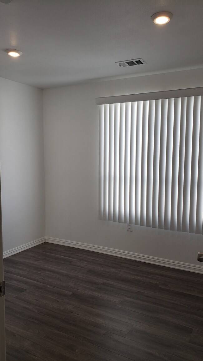 Building Photo - 2057 W Florence Ave