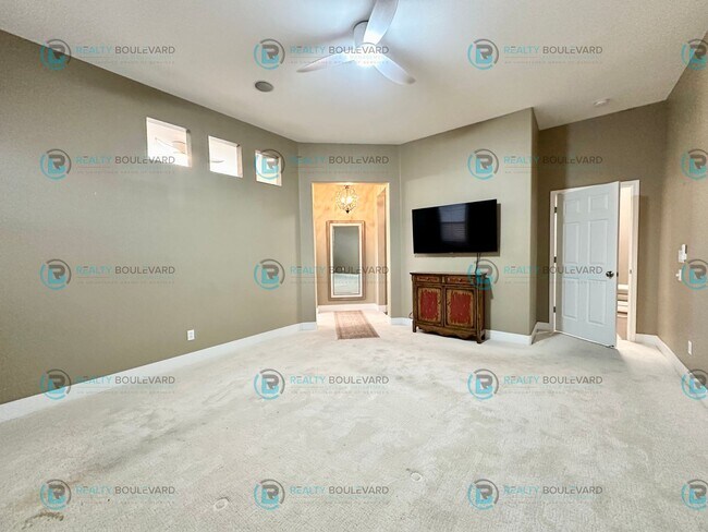 Building Photo - Open Kitchen, Expansive Living, and Covered Patio in Tranquil South Reno Near Trails, Parks & Sho...
