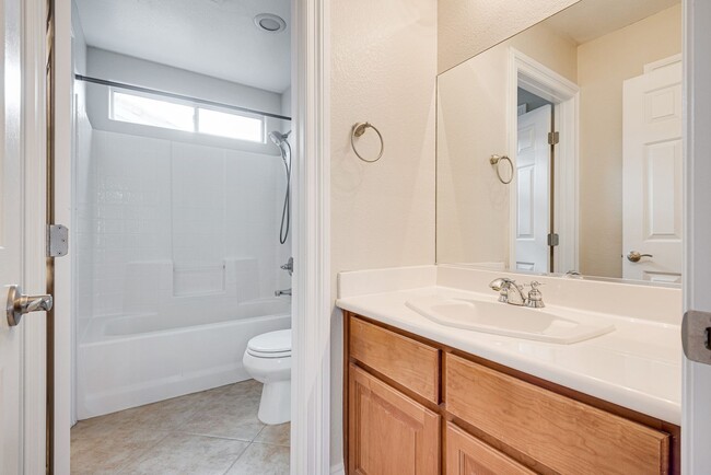 Building Photo - Spacious 3-Bedroom Home Featuring Downstai...