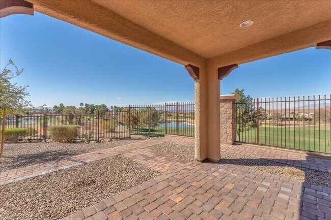 Building Photo - 4-Bedroom Tuscany Townhome with Strip & Golf Course Views