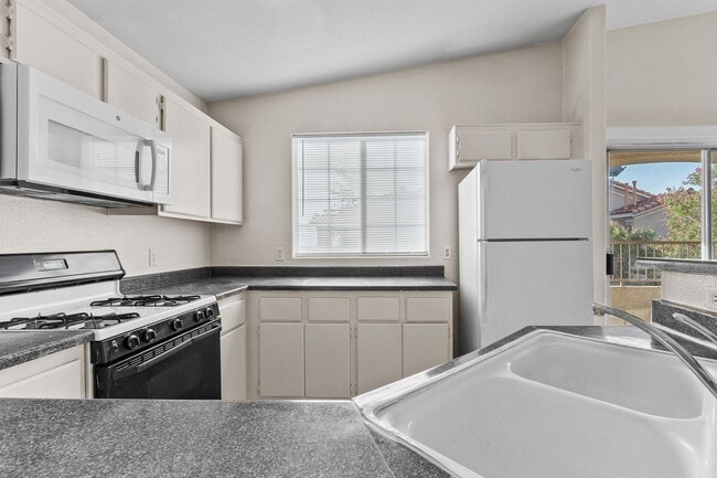 Building Photo - 2nd Floor Condo in a Gated Northeast Commu...