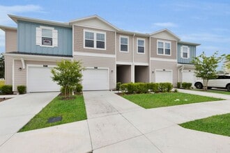 Building Photo - Almost New 3/2/1 Modern Townhome!