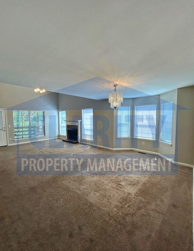 Building Photo - 3-bedroom condo w/ attached garage!