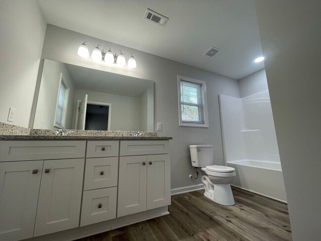 Building Photo - NEW CONSTRUCTION 4 BEDROOM PRE-LEASING FOR...