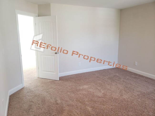 Building Photo - Charming 4 Bedroom, 2.5 Bath, 2-Car Garage...