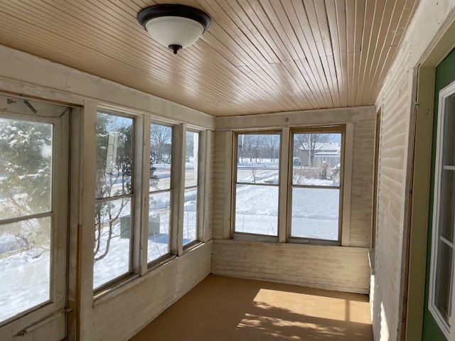 Enclosed front porch - 618 Portage St