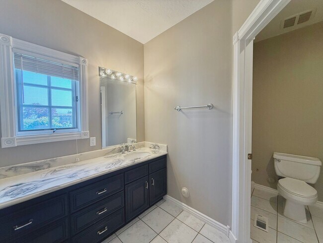 Building Photo - Garden Level in Luxury Home Available Now