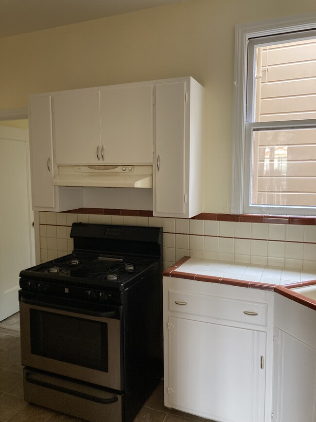 stove and shelving - 1383 21st Ave