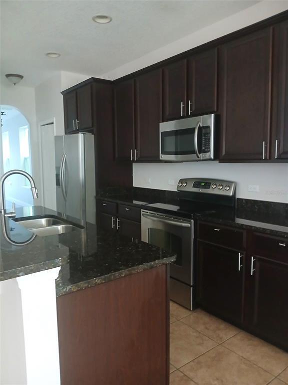 Building Photo - 6242 Golden Dewdrop Trail