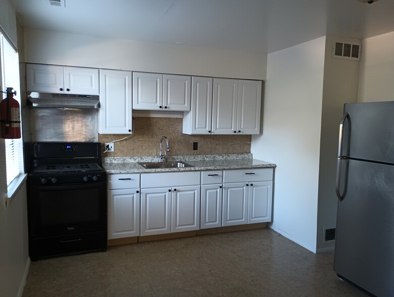 Kitchen to the left of the front door. - 1331 N Black Horse Pike