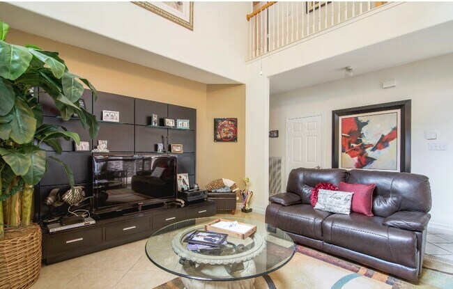 LIVING ROOM WITH 80 IN TV - 14935 Turret Run
