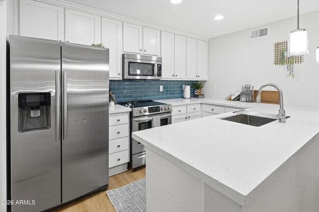 Building Photo - 4704 E Paradise Village Pkwy N