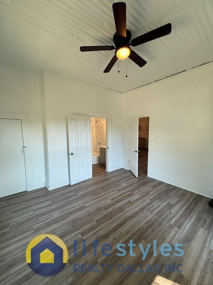 Primary Bedroom w/View of Primary Bathroom - 1750 Maple Ave