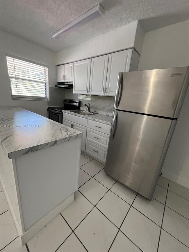 Primary Photo - 7155 W 14th Ct