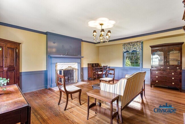 Building Photo - UNIQUE RENTAL HOME ON 1 LANDSCAPED ACRE IN...