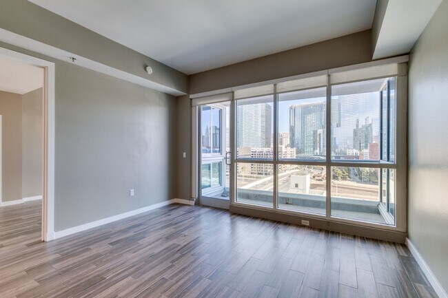 Building Photo - Iconic Strip-View Luxury | Elegant 1BR + Den High-Rise Residence