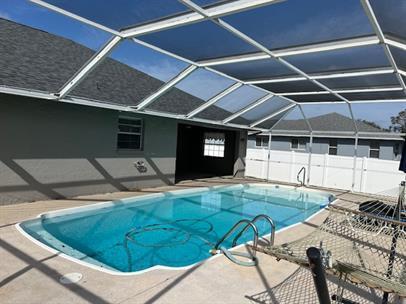 Building Photo - Pool Home in San Carlos Park | 3BR + 2BA | Screened Lanai | $2,895/mo