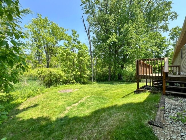 Building Photo - Spacious 3BR Duplex with Finished Basement & 2-Car Garage in Otsego