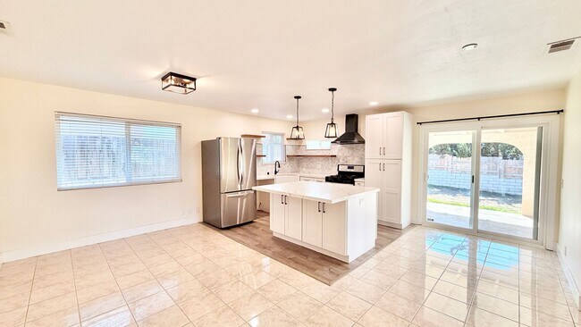 Building Photo - Wonderful Single-Story Home with Remodeled Kitchen and Baths, Fresh Paint, and Minutes to downtow...