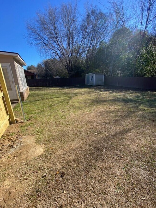 Building Photo - A Quiet Location, $200 Move-N-Special